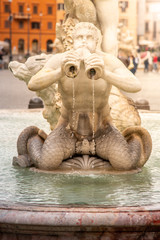 Fototapeta na wymiar Fontana del Moro, or Moor Fountain, on Piazza Navona, Rome, Italy. Detailed view of sculptures