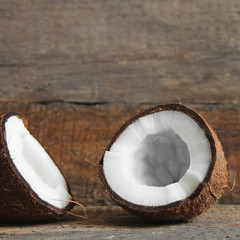Coconut on a wooden background. Chopped coconut