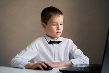 education concept - student with computer studying at school