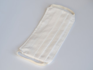 Sewing a protective medical mask to protect against COVID-19. Handmade (Do-it-yourself) cotton...