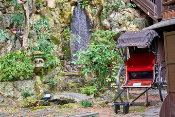 Old rickshaw in the garden n a way to the top of the mountain.