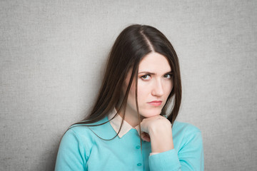 Pretty young offended  woman feeling angry