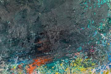 Background image of bright oil-paint palette closeup.