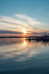 Obraz premium sunset over the river