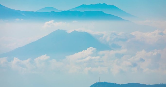 Mount Argopuro, Indonesia - July 23, 2019: Timelapse from the trembling clouds and landscape surrounding the Argopuro inactive volcano, in East Java, Indonesia, photographed not far from Bromo area.