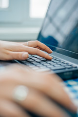 Young manager working with notebook in the office