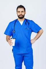 Middle-aged male doctor in blue uniform on white background showing different emotions