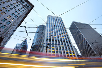 Street car cables and skyline of buildings at Financial District in San Francisco, California,...