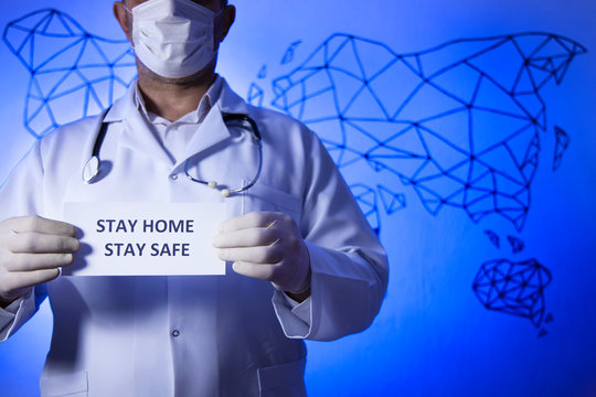 A doctor with a paper with stay at home holding on hand, protect from Coronavirus or Covid-19 epidemic.