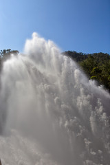 Water gushing from Tinaroo Falls Dam on the Atherton Tableland in Tropical North Queensland, Australia