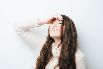 Fototapeta premium brunette girl remembered on a white background