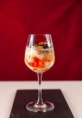Vegan tasty dessert with green buckwheat in goblet.
