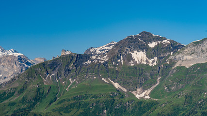 Fototapeta na wymiar Switzerland, Panoramic view on Schilthorn and green Alps around