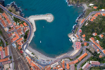 Aerial drone top-down photo of a small coastal village in France called Cerbere