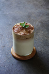 Dalgona coffee is a beverage made by whipping equal proportions of instant coffee, sugar and hot water until it becomes creamy and then adding it to cold or hot milk. 