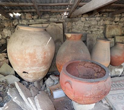 Several ancient pithos under shade port in Chersonesus, Sevastopol, Crimea.