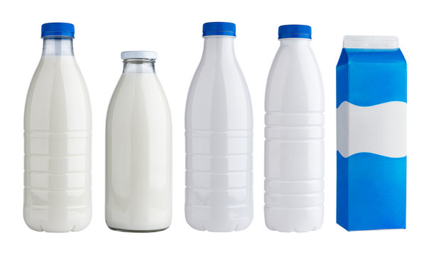 Packaging for dairy products, plastic and glass bottles for milk isolated on white background