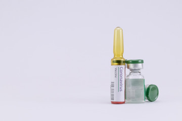 Coronavirus vaccine ampoule with two vials in Epidemiology concept.CR2