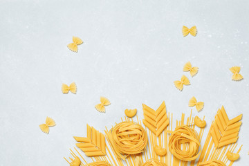 Italian food  and coocking concept.  Menu design.  Various uncooked pasta on white background.  Raw pasta composition. Pasta scetches. Italian cuisine