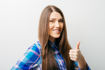 Success woman showing thumbs up