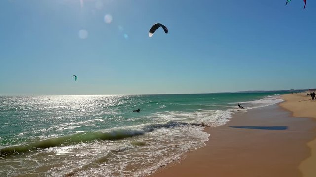 Extreme water sport kit surfing, practiced by athletes on the Atlantic Sea, in Portugal, Europe.