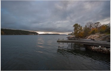 
Wooden pier and evening lake