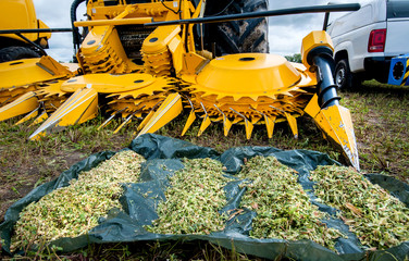 part of harvester Forage cruiser at exhibition of silage samples