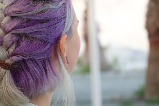 Profile Of Young Woman With Purple Hair At The Beach