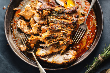Baked pork with spices and herbs