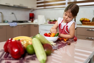 Young girl with vegetables