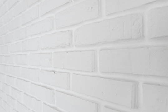different view of the white brick wall,stylish white wall,white brick wall after repair © Vadym