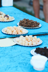 plates with cheese and bread