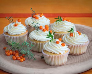 vanilla cupcakes with sea buckthorn berries