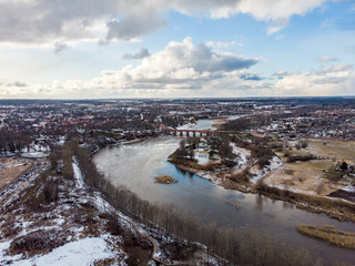 Areal drone photography view of small countryside city Kuldiga, with river Venta.