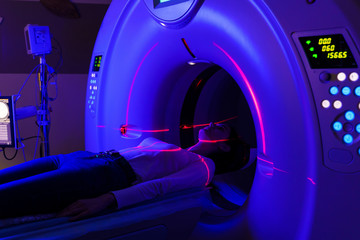 CT of joints in a clinic with blue color and red scanning laser. computer diagnostics of injuries,...