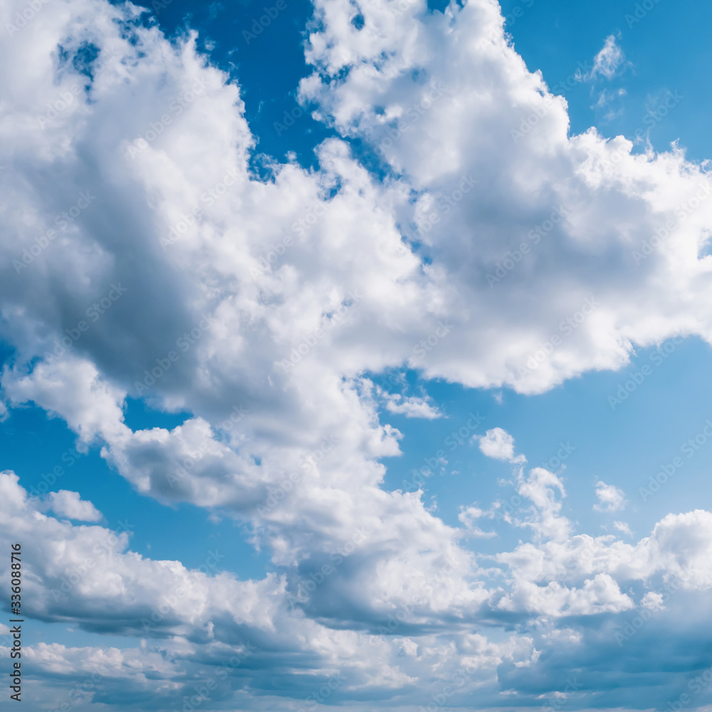 Wall mural cloudy blue sky