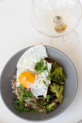fried egg with salad on white