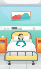 Hospital room with a bed and bedside tables. Cozy hospital. The patient is lying in bed. Fighting coronavirus in hospitals.