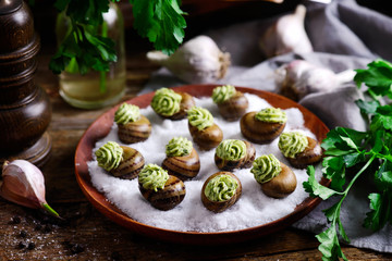 Burgundy escargot with herb butter.style rustic.