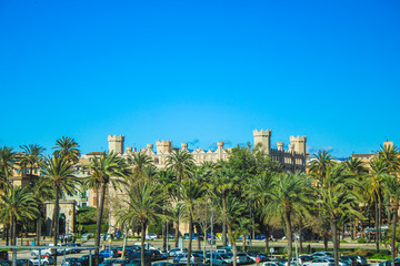 Fototapeta na wymiar Castell de Bellver in the capital Palma de Mallorca, view from the harbour Port de Palma, Spain