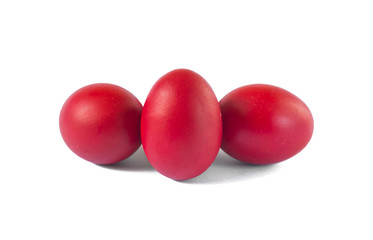 Three red easter eggs isolated on white background