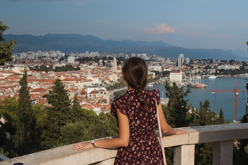 Fototapeta na wymiar young woman on the pier croatia