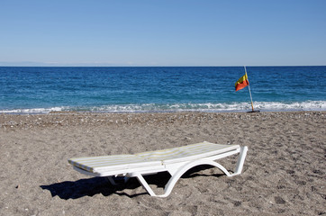 lounge chairs on the beach