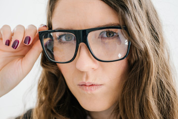 beautiful brunette girl with big glasses