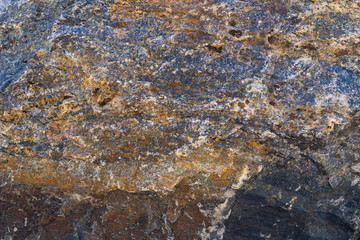 Texture of natural rock granite natural rock granite, magmatic structure with quartz and mica and traces of erosion.