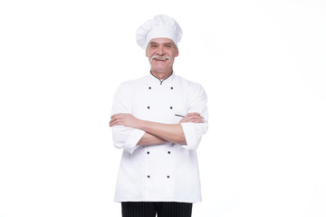 Successful eldery chef crossed arms, portrait on white background isolated