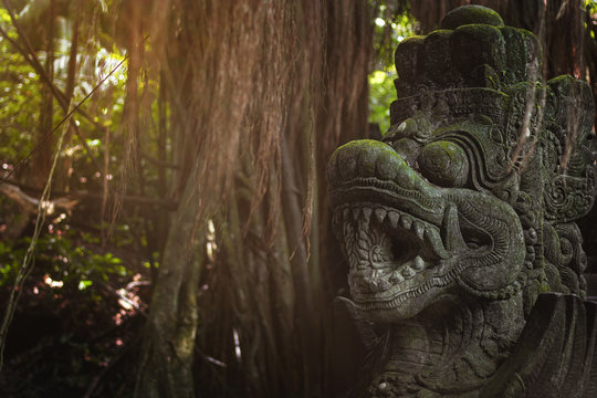 Bali background. Stone sculpture at sacred monkey forest in Ubud, island Bali, Indonesia. Close up - Image