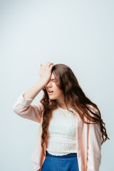 on a gray background young girl in chagrin