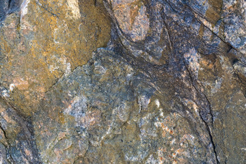 Texture of natural rock granite natural rock granite, magmatic structure with quartz and mica and traces of erosion.