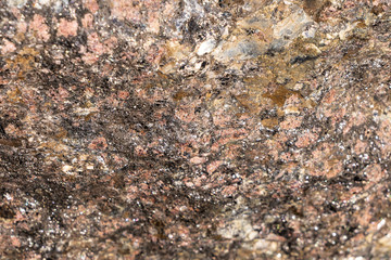 Texture of natural rock granite natural rock granite, magmatic structure with quartz and mica and traces of erosion.